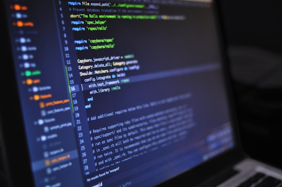 pexels-photo-546819-546819-1 Close-up of a computer screen displaying programming code in a dark environment.
